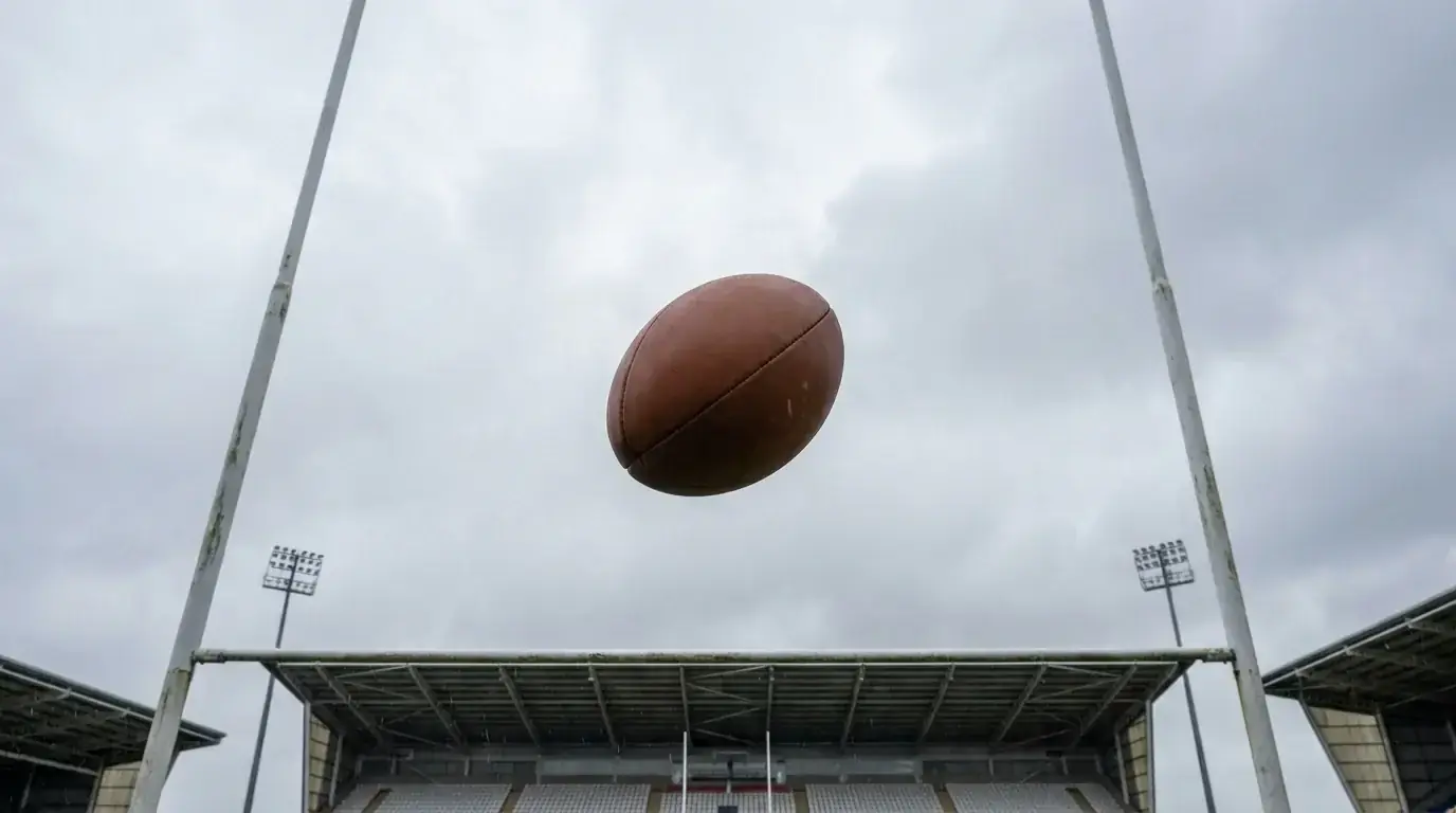 Rugby ball flying through the posts as a points line graphic appears in the stadium air